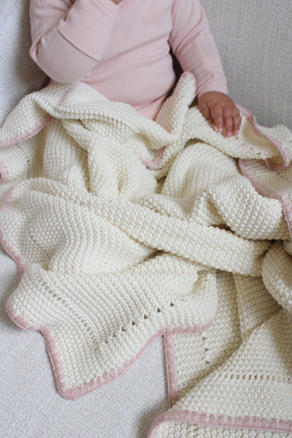 Blush Trim Knitted Blanket
