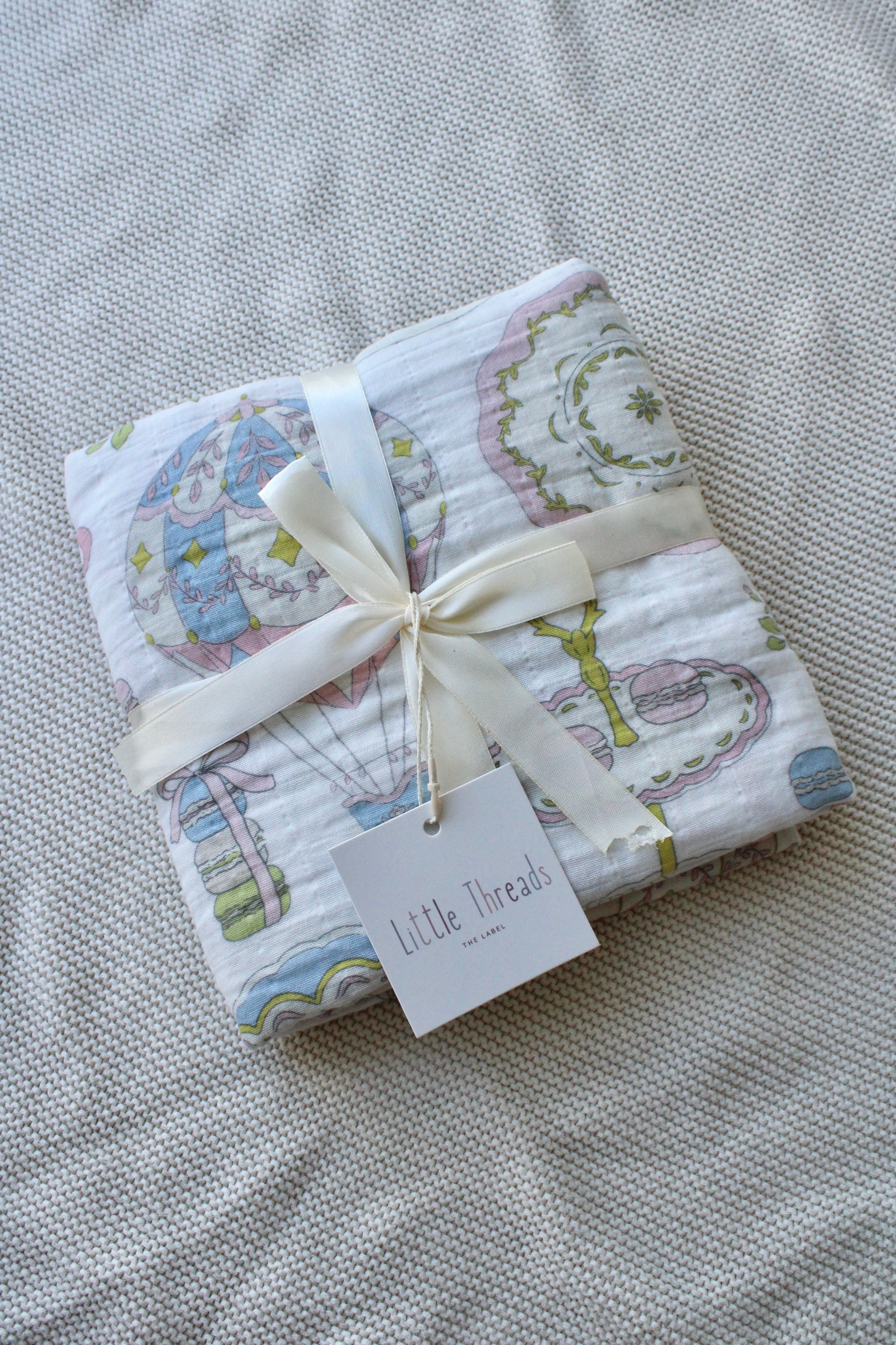 Dreamy Carousel Muslin Blanket